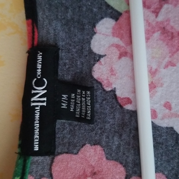 Dress in orange and black. - Picture 2 of 3